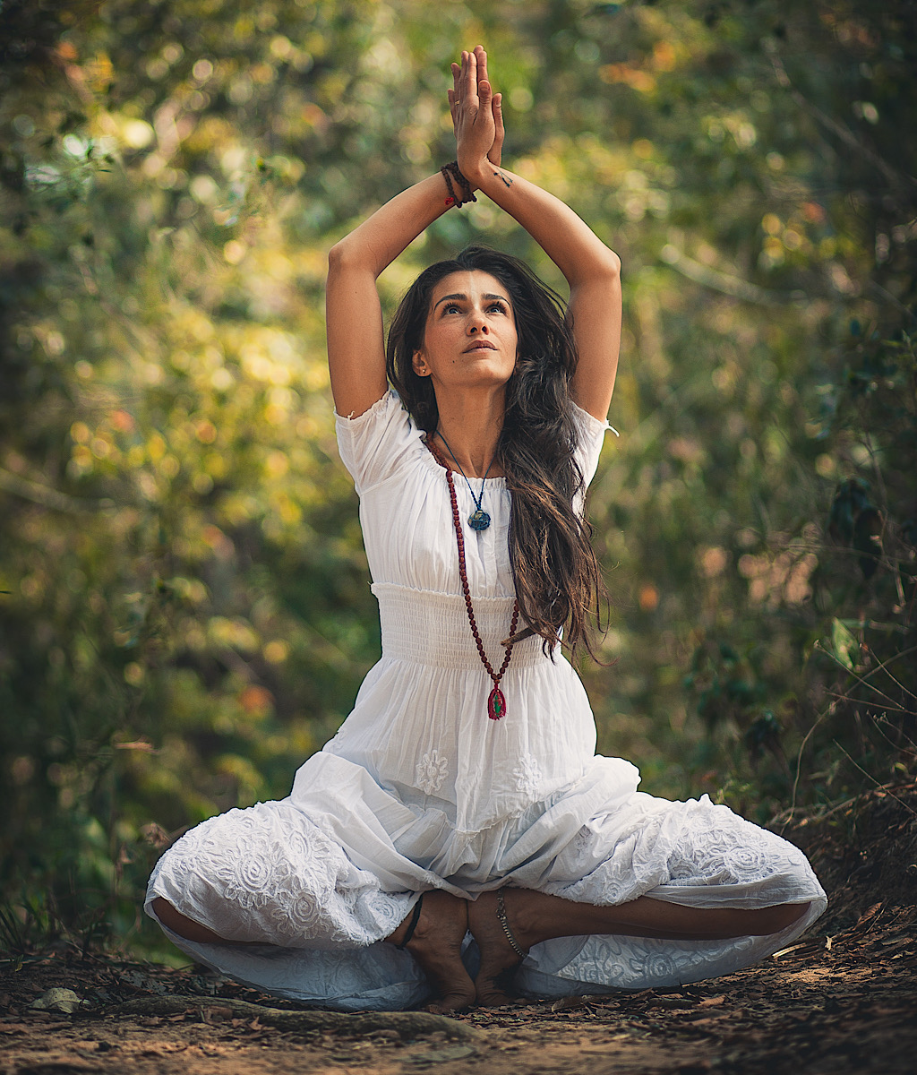 Women doing yoga outdoors at sunrise. Morning meditation Stock Photo by  leikapro